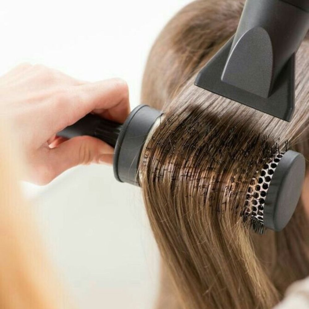 Blended balayage color melt on mid-length hair by a Hāste colorist in Medford