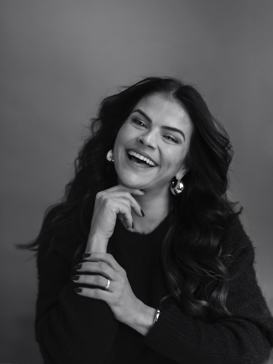 Portrait of Tatiane Martins, Haircare Specialist at Hāste Urban Hair Spa