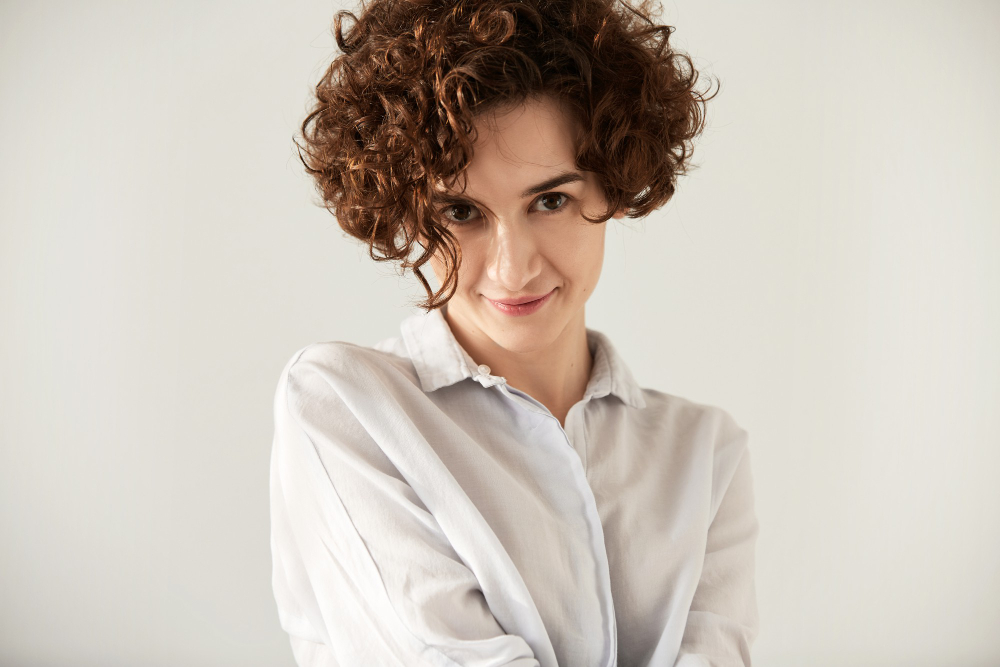 10 Stunning Coiled Bangs Hairstyles to Try in 2025 4 short curly bangs
